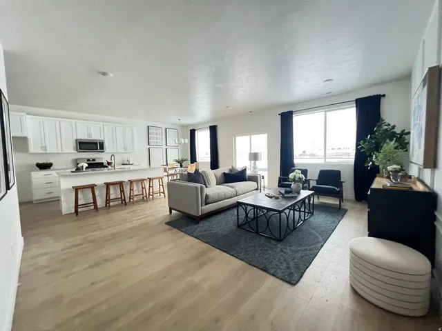 Living area with light wood-style flooring