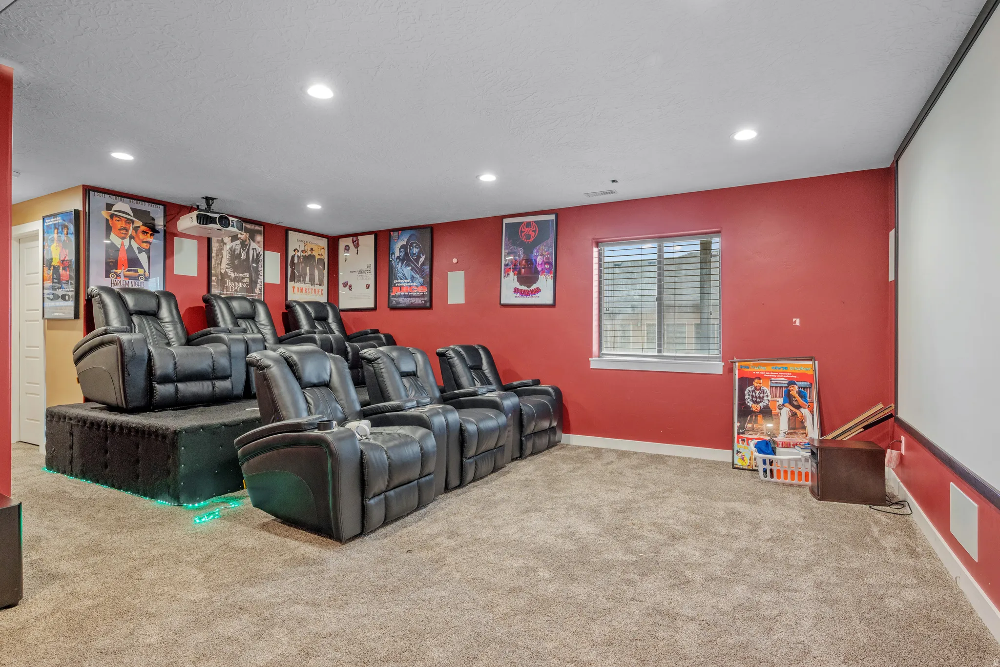 Carpeted cinema with recessed lighting and baseboards