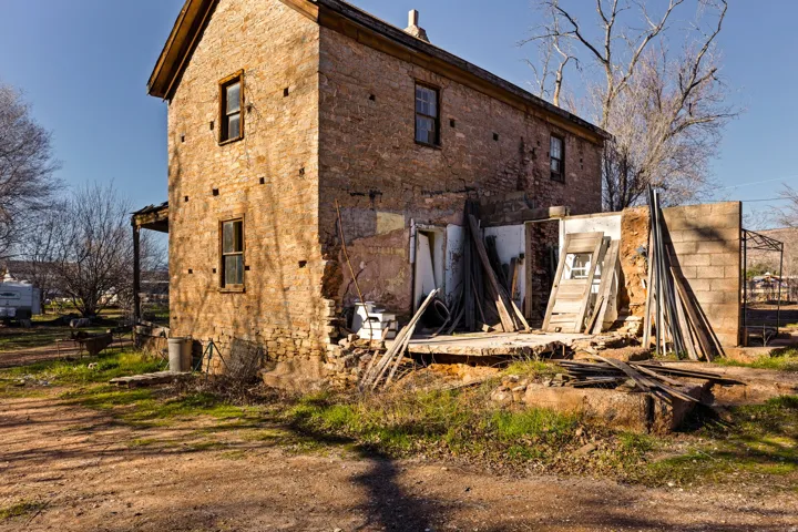 View of side of property with brick siding