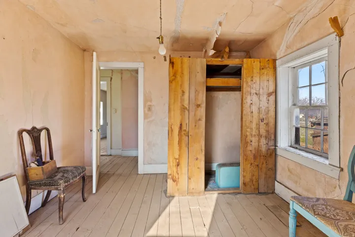 Bedroom with wood-type flooring