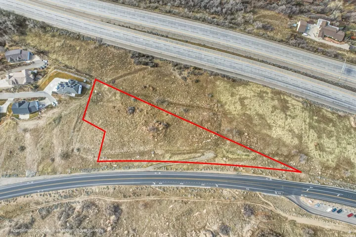 Aerial view of property's location with property parcel outlined