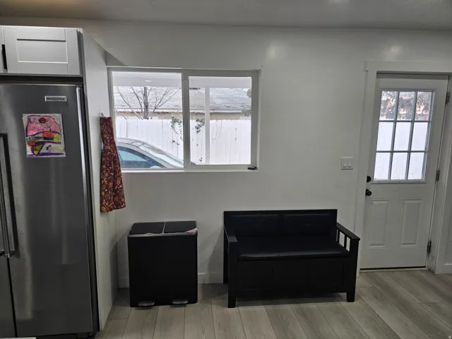 Entryway featuring wood finished floors and plenty of natural light