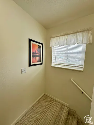 Stair landing with south window