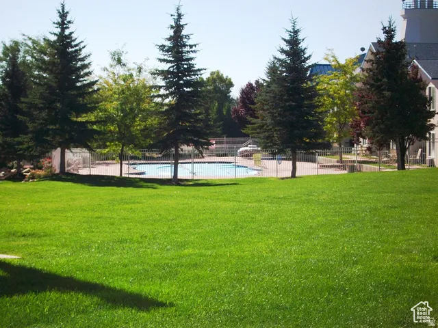 View of yard and pool @ Harbor Village