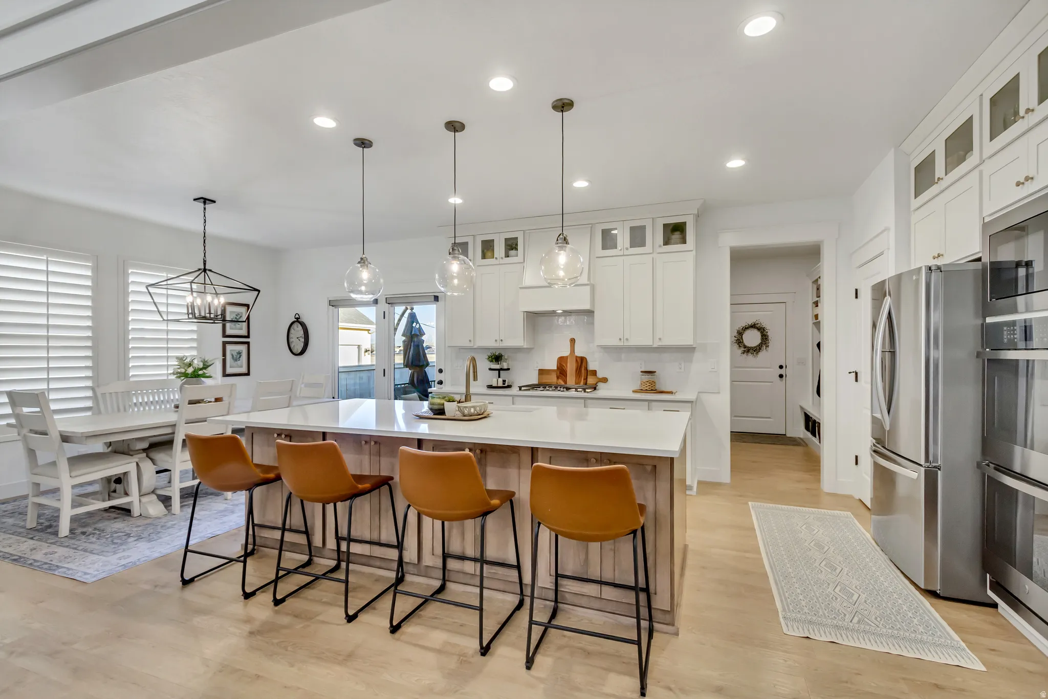 Kitchen with quartz counter tops, storage in island.