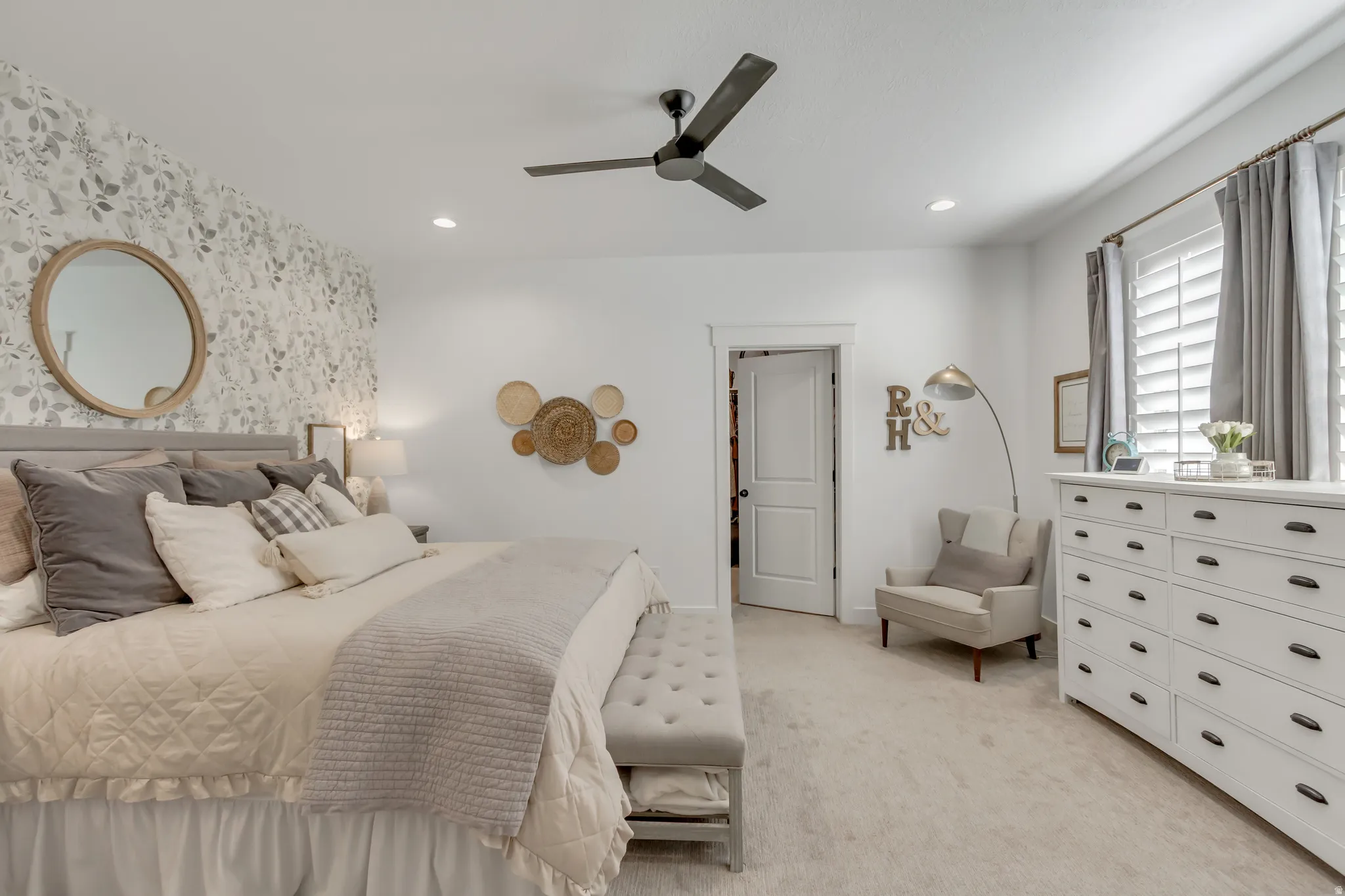 Primary Bedroom, walk in closet, plantation shutters, natural light.