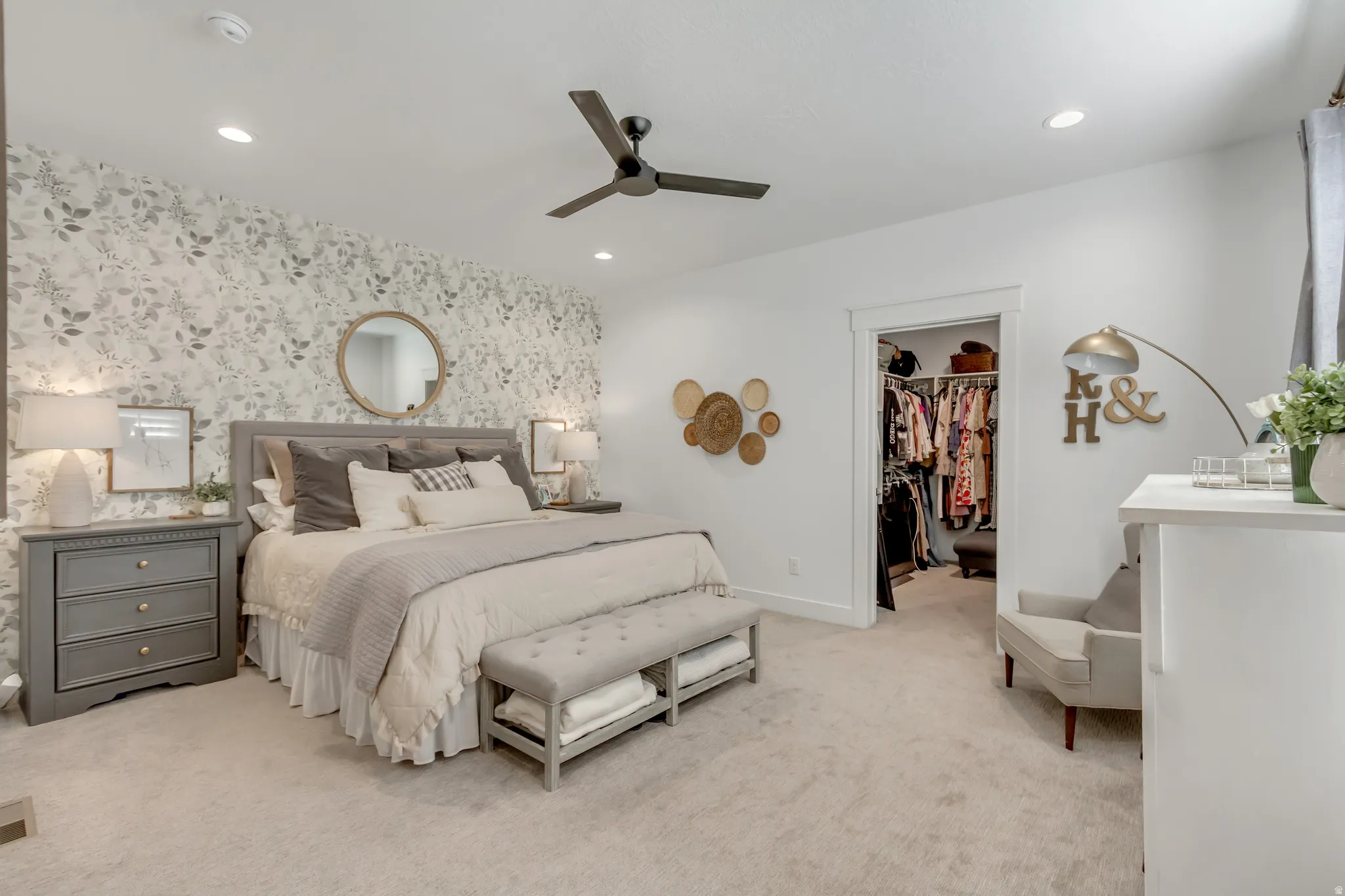 Primary Bedroom on main level, 9' ceilings, walk in closet, and private full bath.