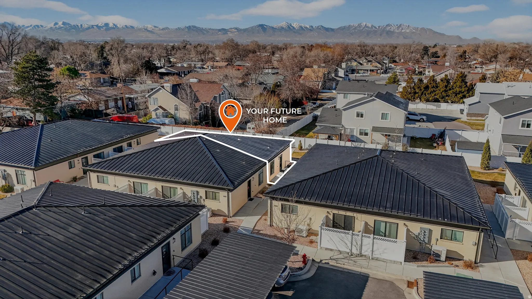 Aerial view of residential area with mountains