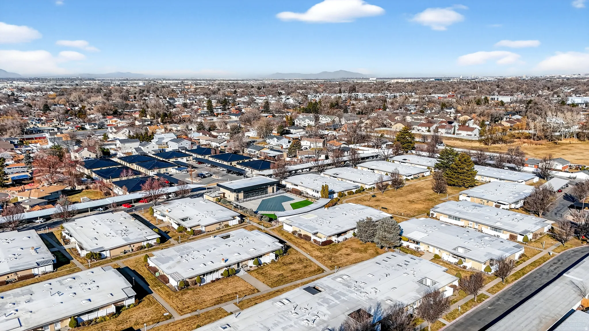 Aerial overview of property's location featuring mountains