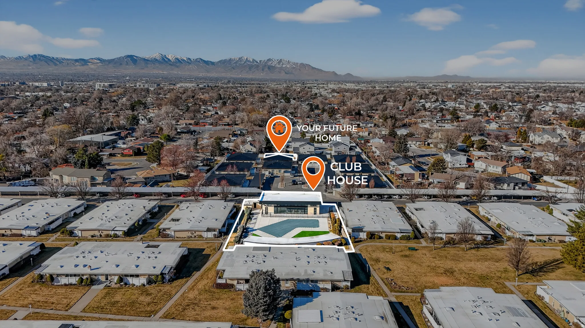 Aerial view of property's location with a mountainous background and nearby suburban area
