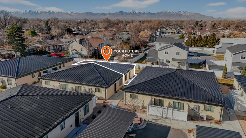 Aerial view of residential area with mountains
