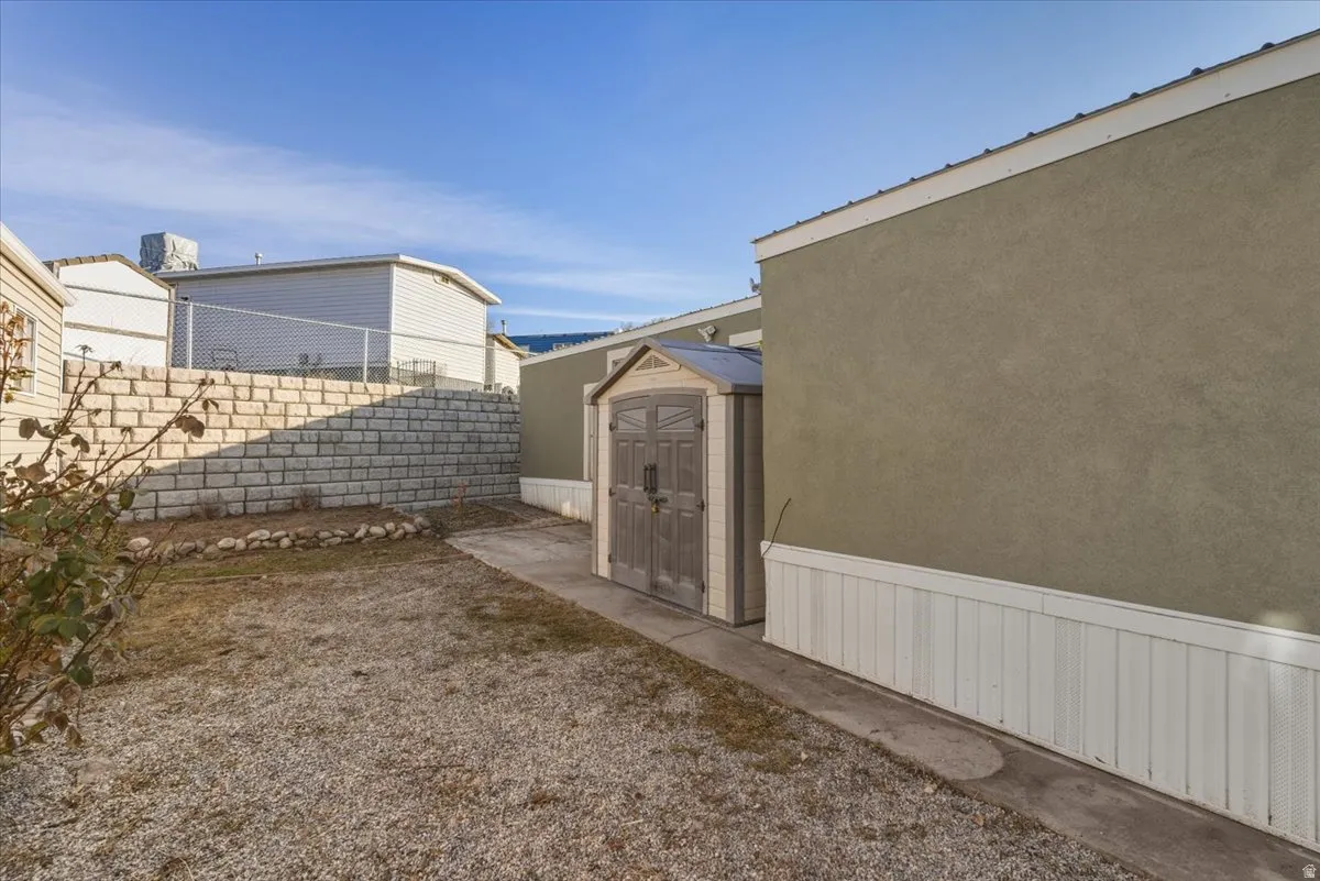 A dedicated garden area provides space for planting, outdoor hobbies, or additional outdoor enjoyment.