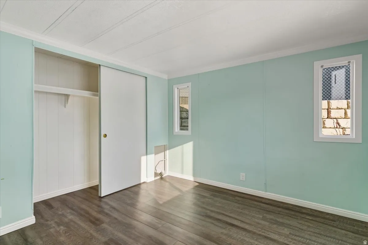 A quiet sanctuary featuring ample closet space and large windows that invite natural light. It’s sized perfectly for a queen or king-sized set, offering a peaceful escape at the end of the day.