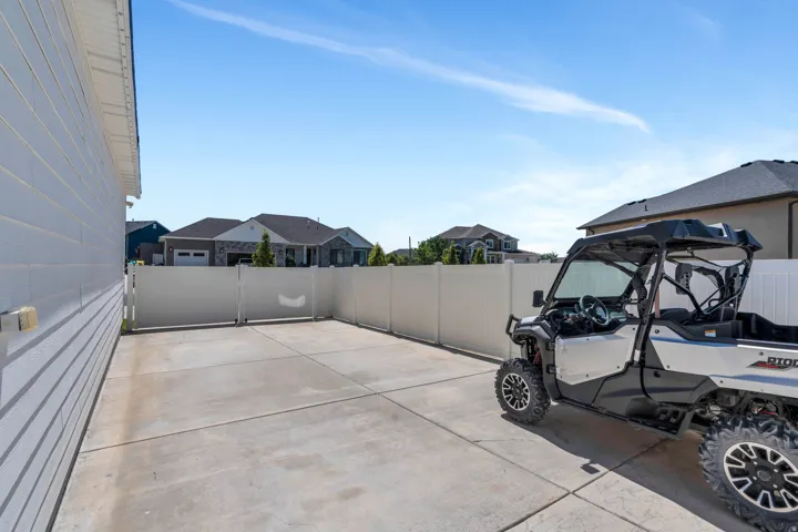 View of parking featuring a residential view