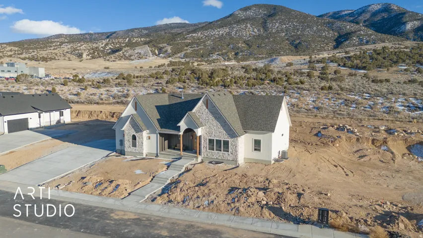 View of subject property featuring mountains