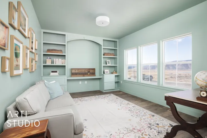 Living room featuring built in shelves and dark wood-style flooring
