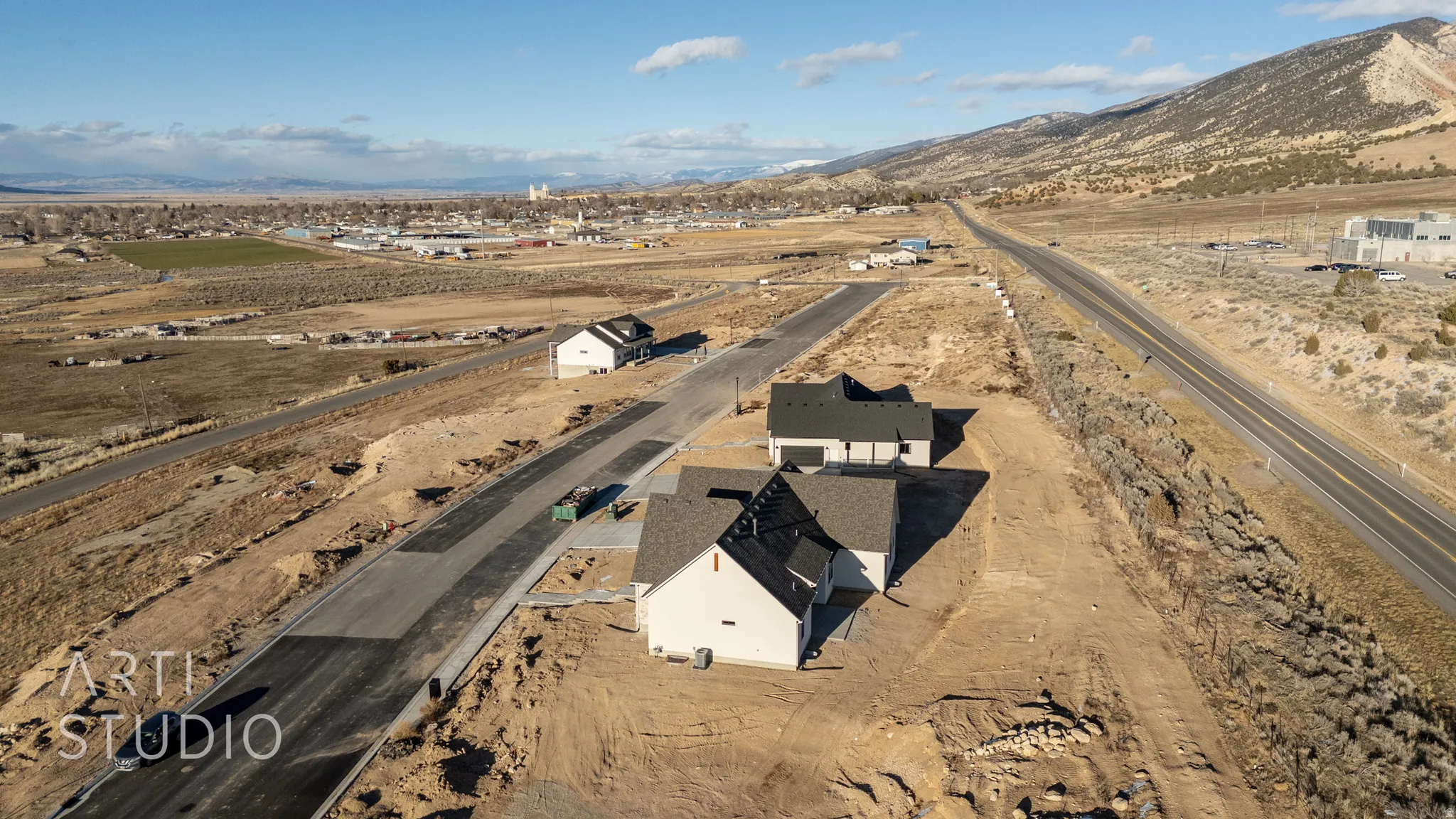 View of subject property featuring a mountain backdrop