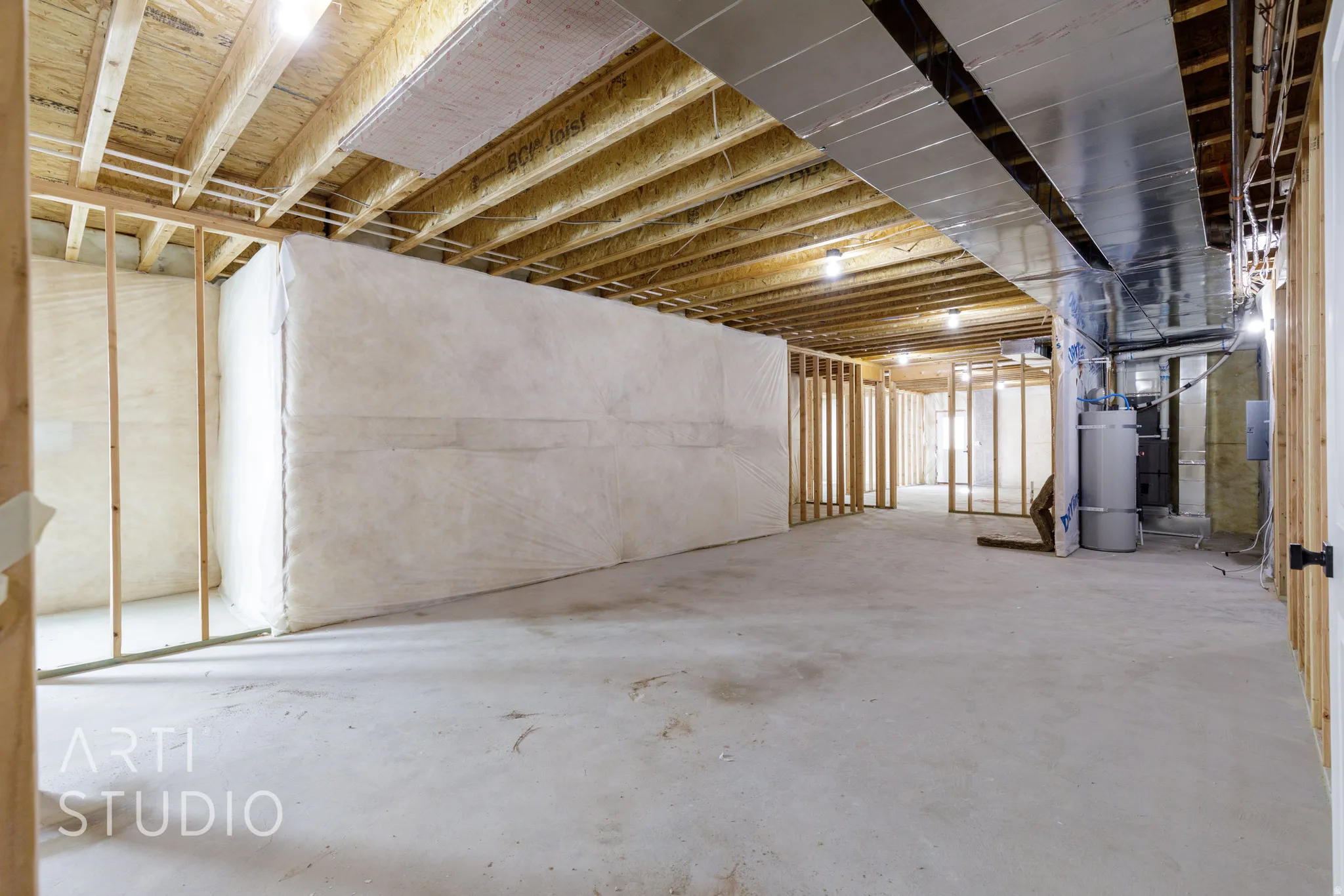 Unfinished basement with water heater