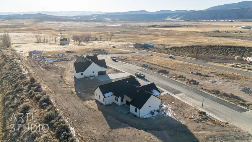View of property location featuring a mountainous background and rural landscape