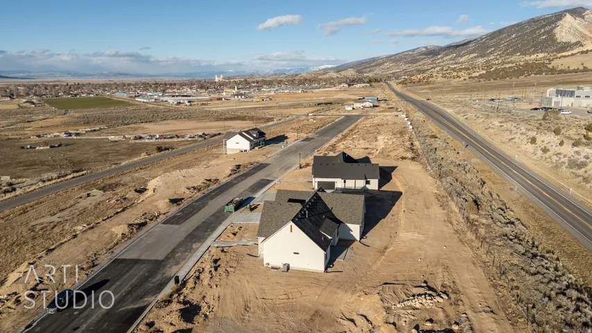 View of subject property featuring a mountain backdrop