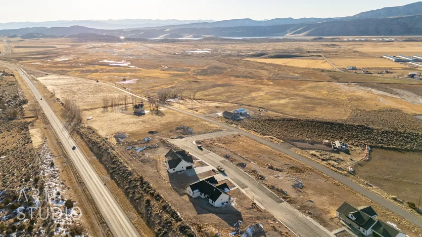 Aerial view of property and surrounding area with rural landscape
