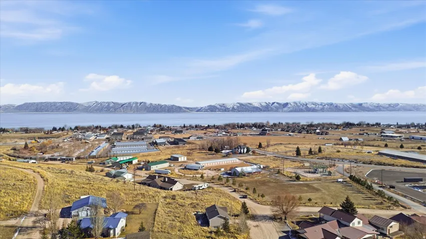 Aerial view of residential area with a water and mountain view