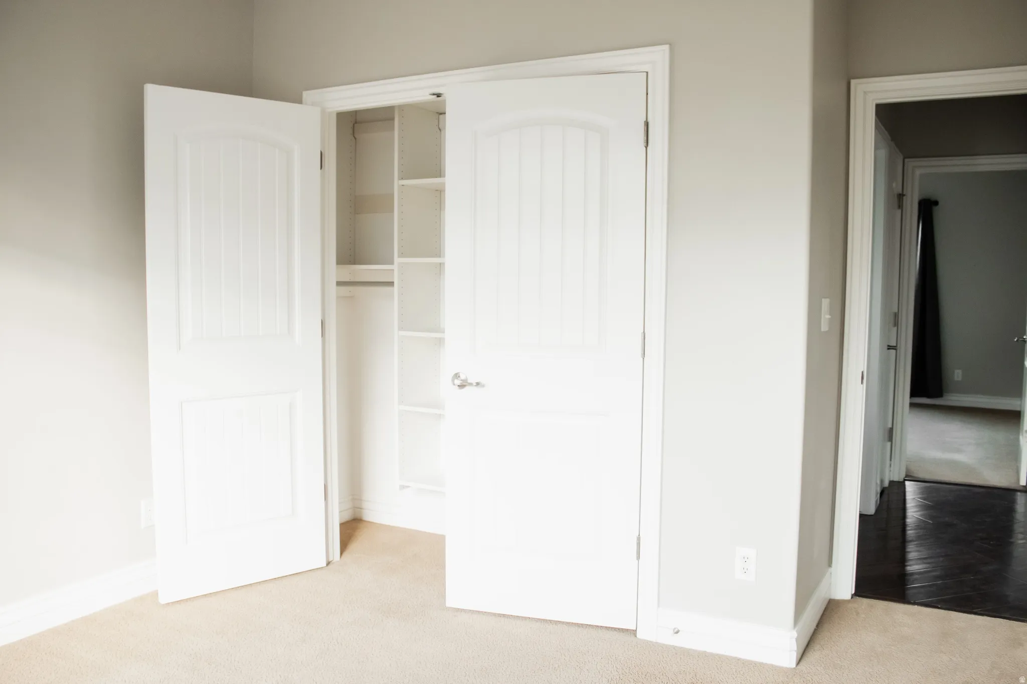 Bedroom with carpet floors and a closet