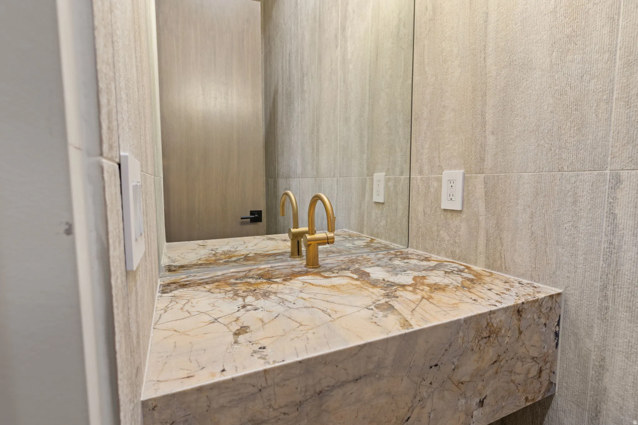 Bathroom featuring Patagonia floating sink