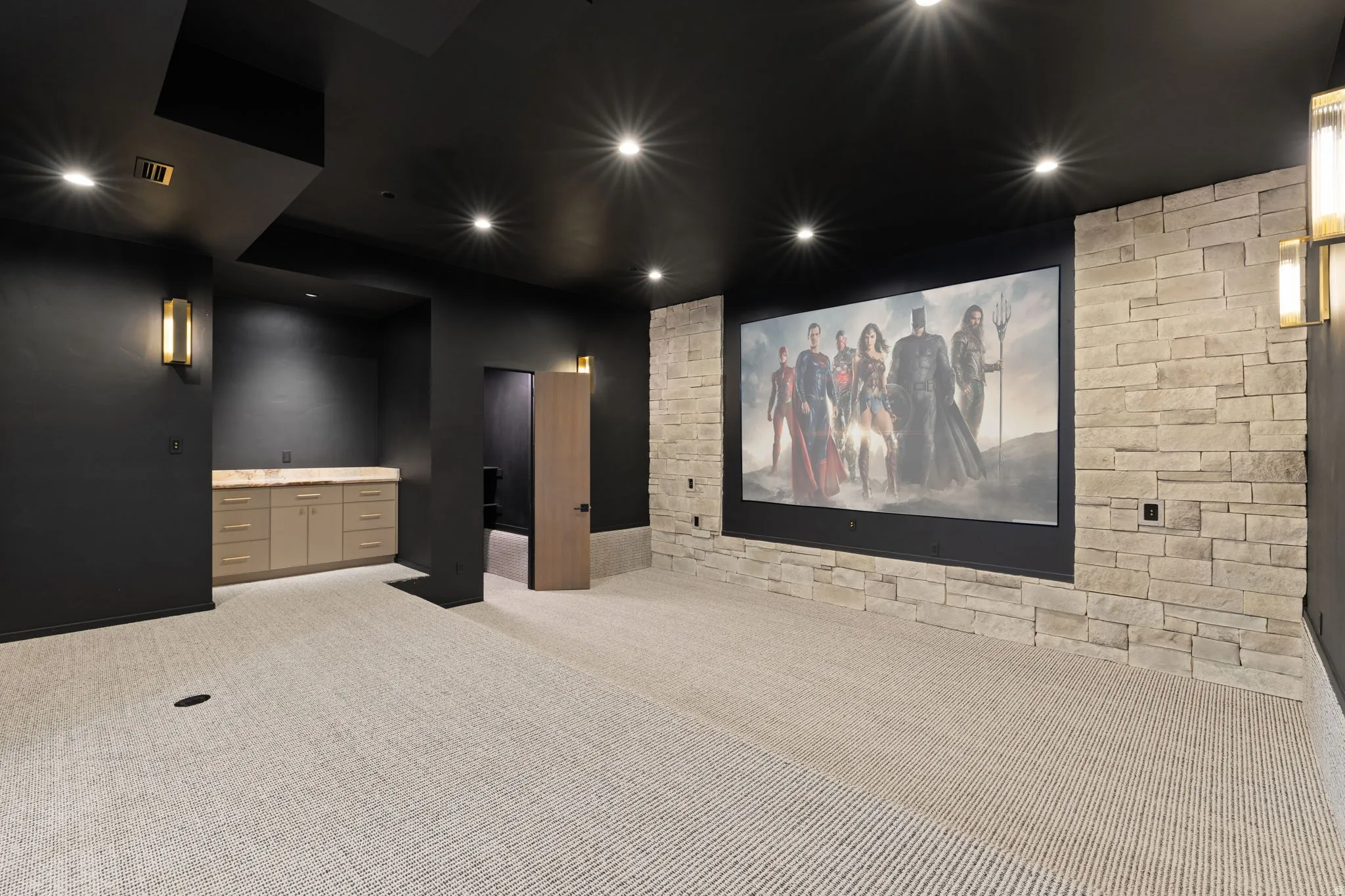 Home theater with light carpet and recessed lighting