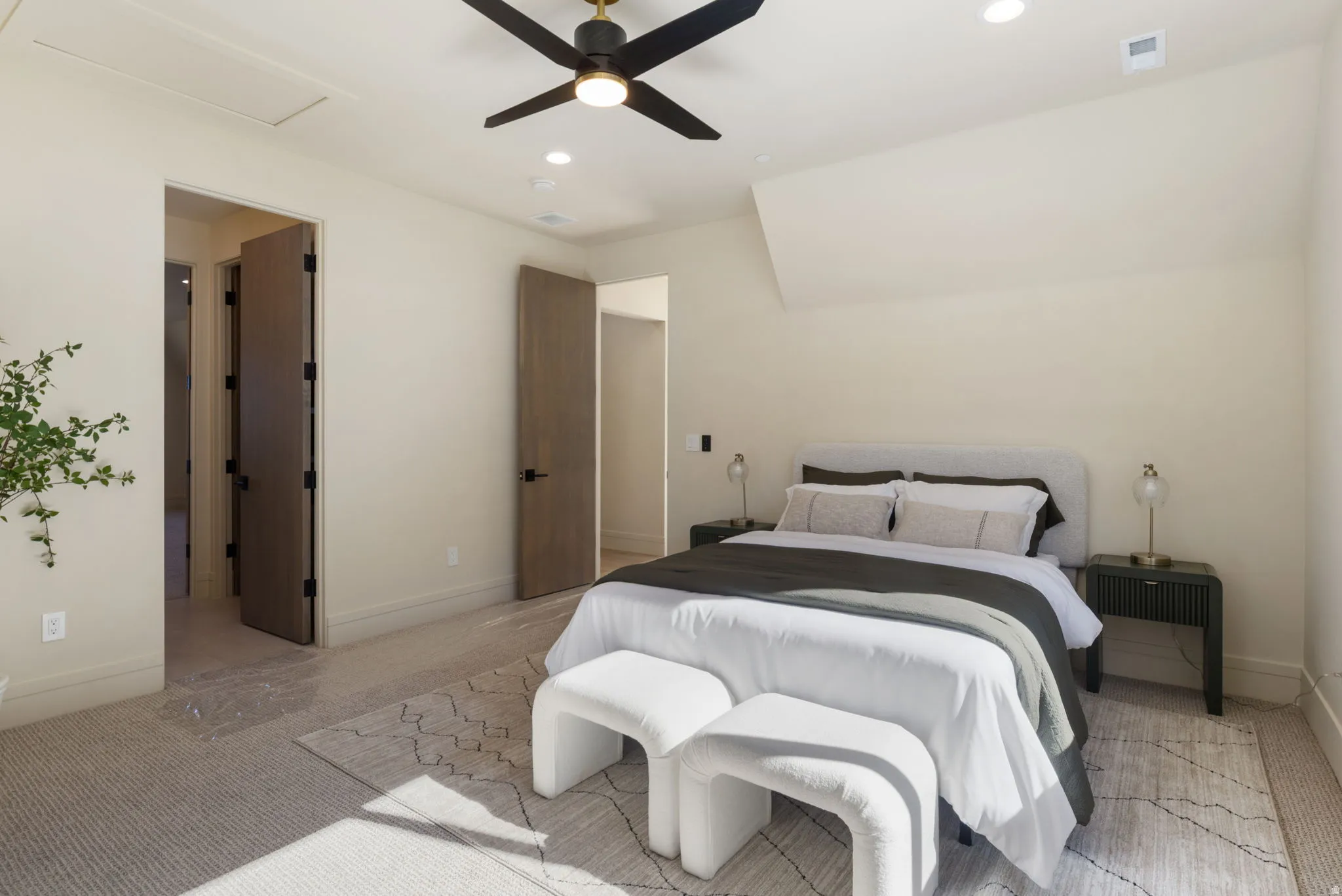Bedroom with recessed lighting, light carpet, and a ceiling fan