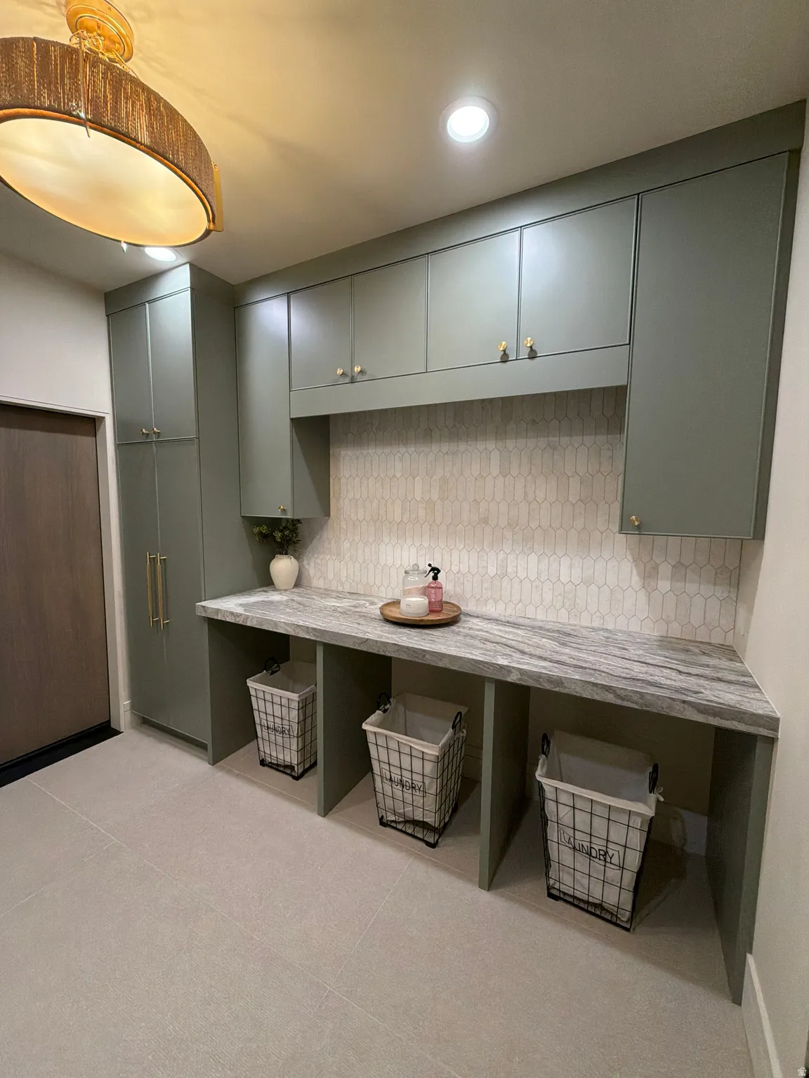 Laundry room featuring recessed lighting