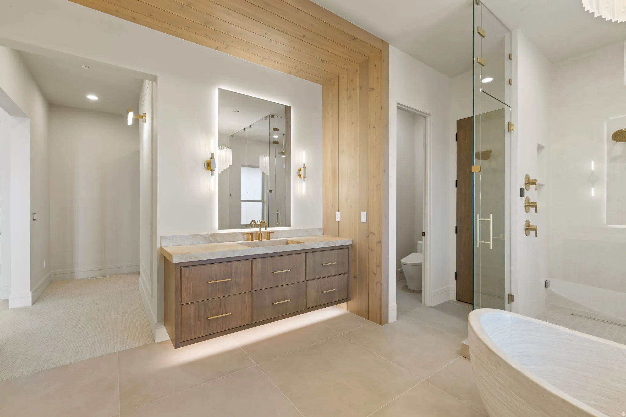 Primary Bathroom featuring vanity, a stall shower, recessed lighting, and light tile patterned flooring