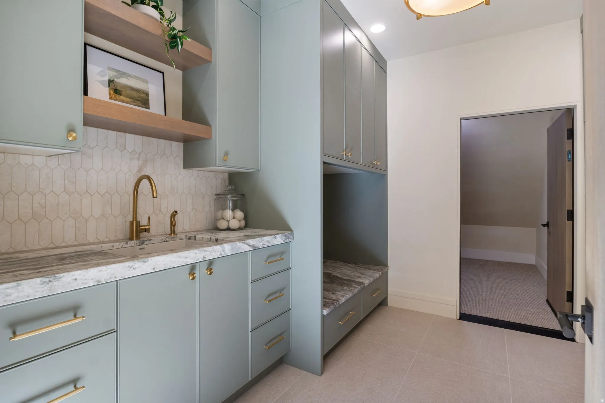 Kitchen featuring open shelves, gray cabinetry, backsplash, light tile patterned floors, and recessed lighting