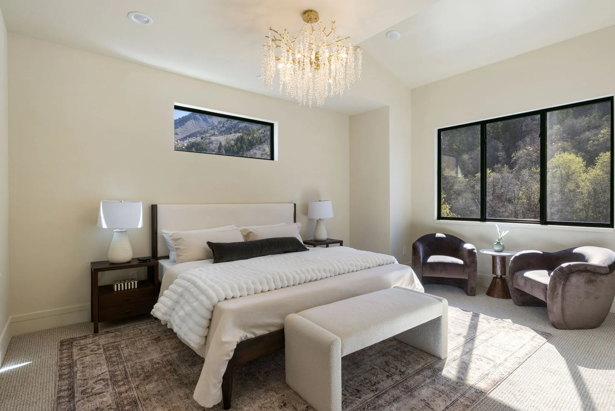 Bedroom with carpet, a chandelier, and lofted ceiling