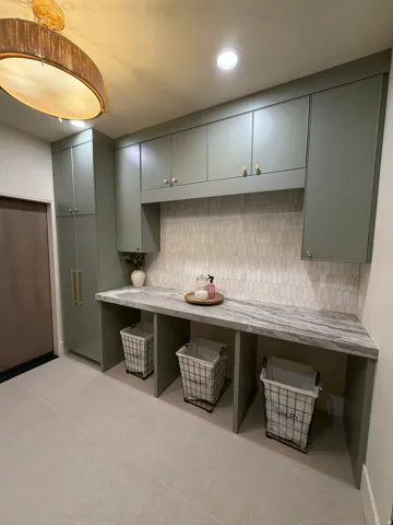 Laundry room featuring recessed lighting