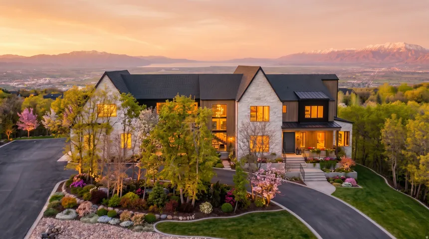 Mountain Modern architectural design featuring stone and wood-finish siding