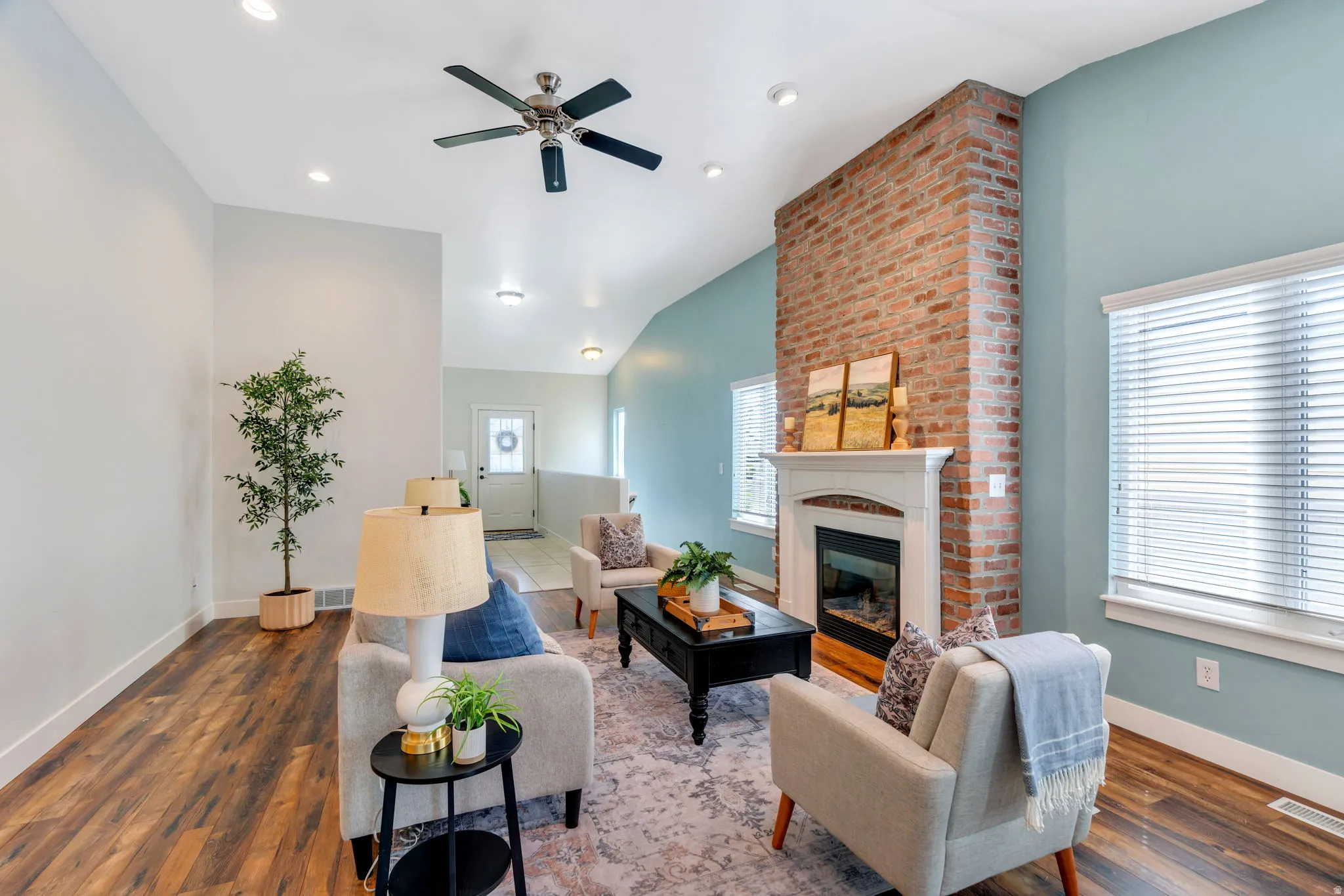Beautiful wood floors really accentuate the warmth of the great room.