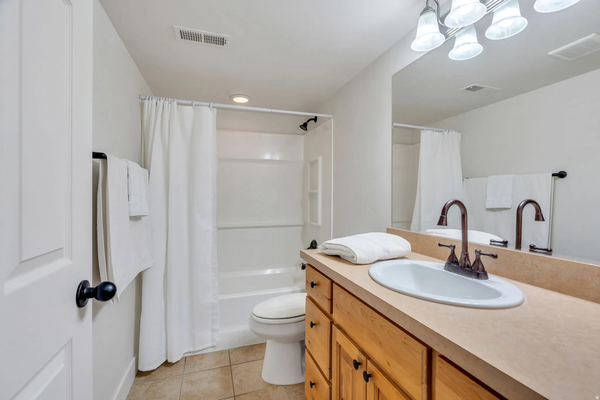 Downstairs Full Bathroom provides an opportunity for guest suites for family or rental potential.