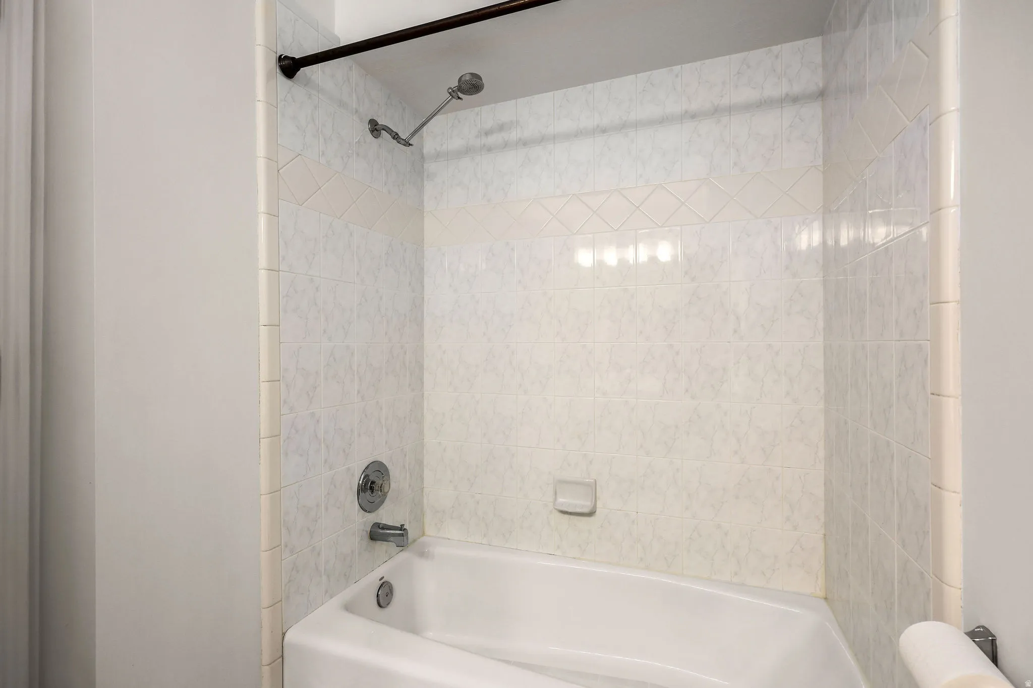 Full bathroom with shower / washtub combination