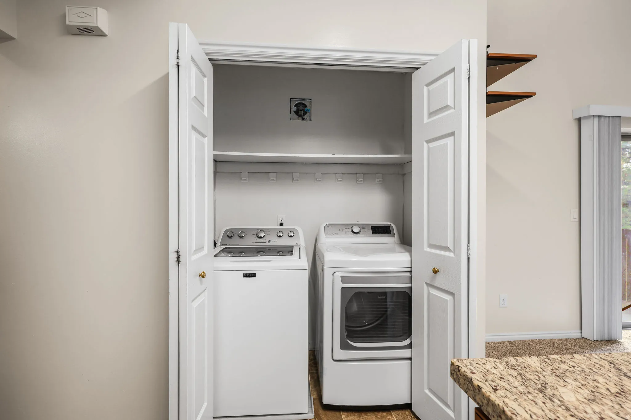 Laundry area featuring independent washer and dryer (included)