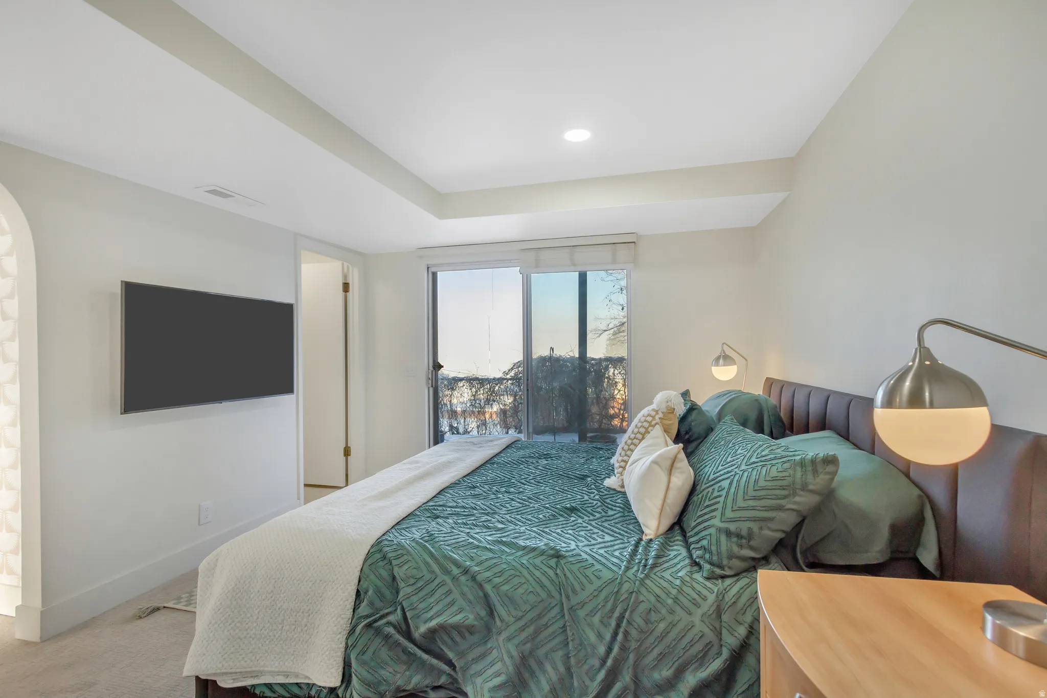 Carpeted bedroom with access to outside and recessed lighting
