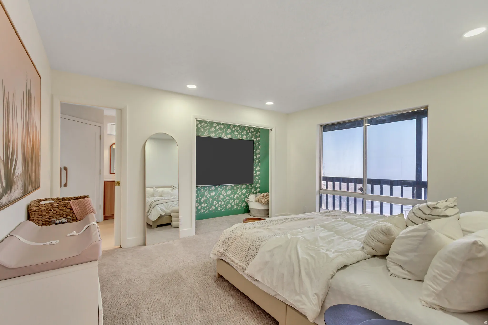 Carpeted bedroom with recessed lighting and baseboards