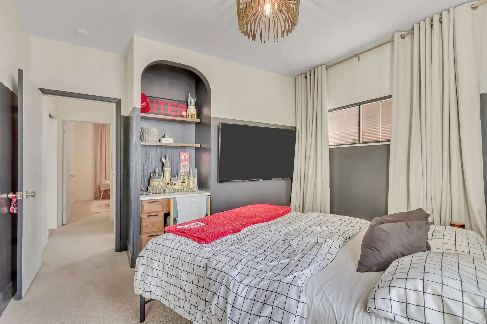 Bedroom with light carpet