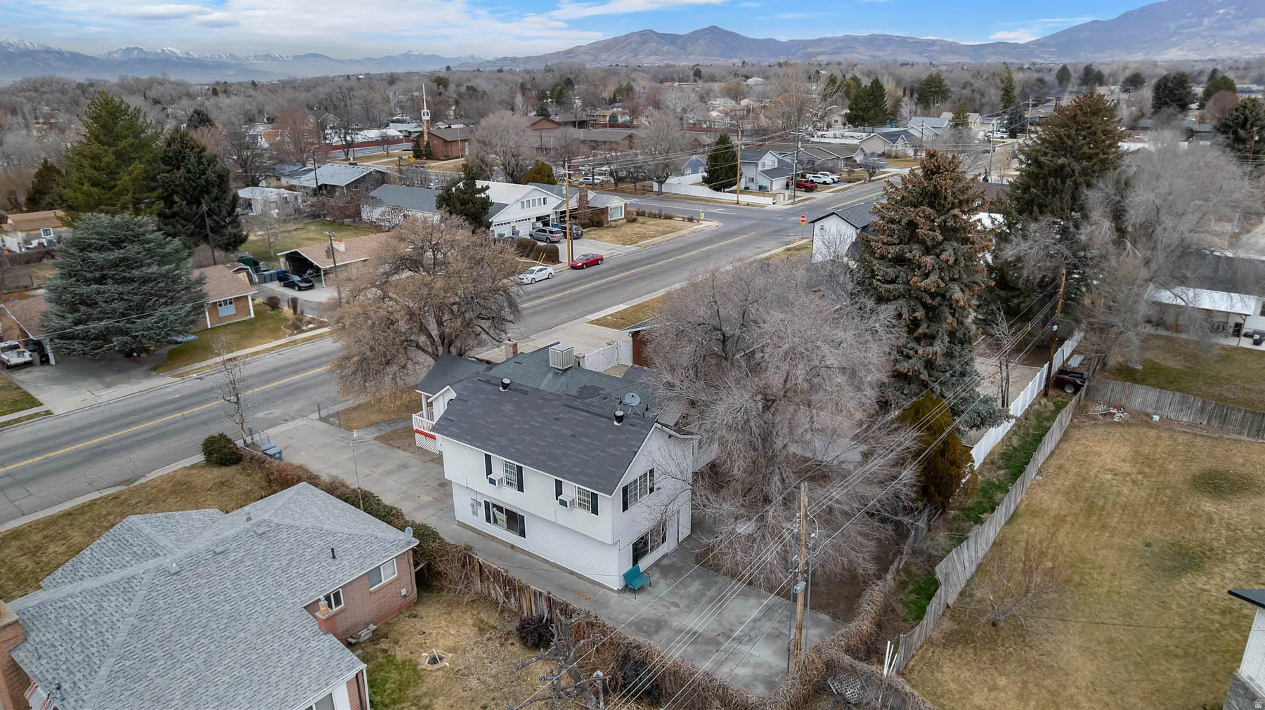 Aerial view of residential area with mountains