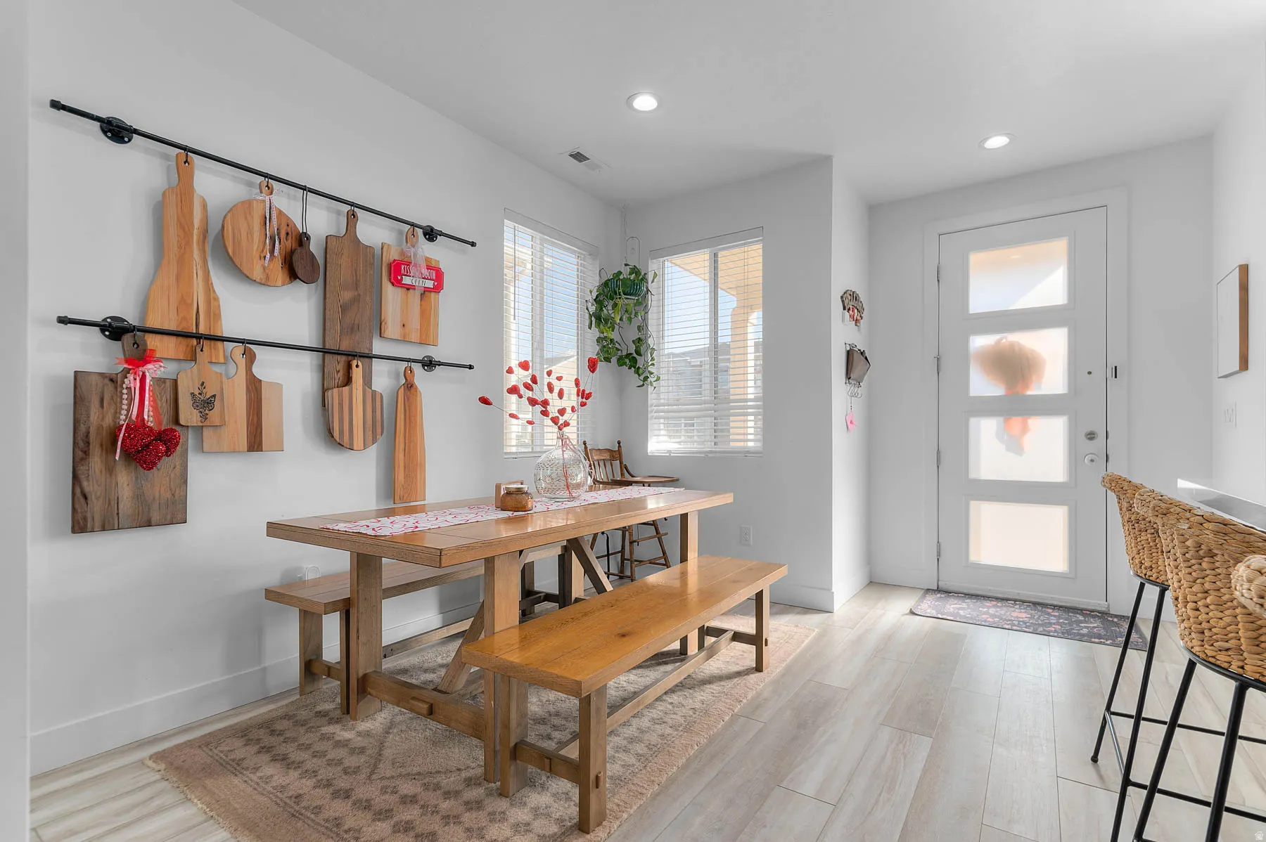 Dining space featuring light wood-style flooring and recessed lighting