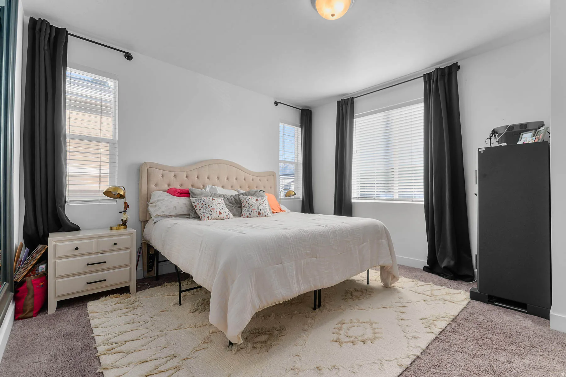 Master Bedroom with light carpet