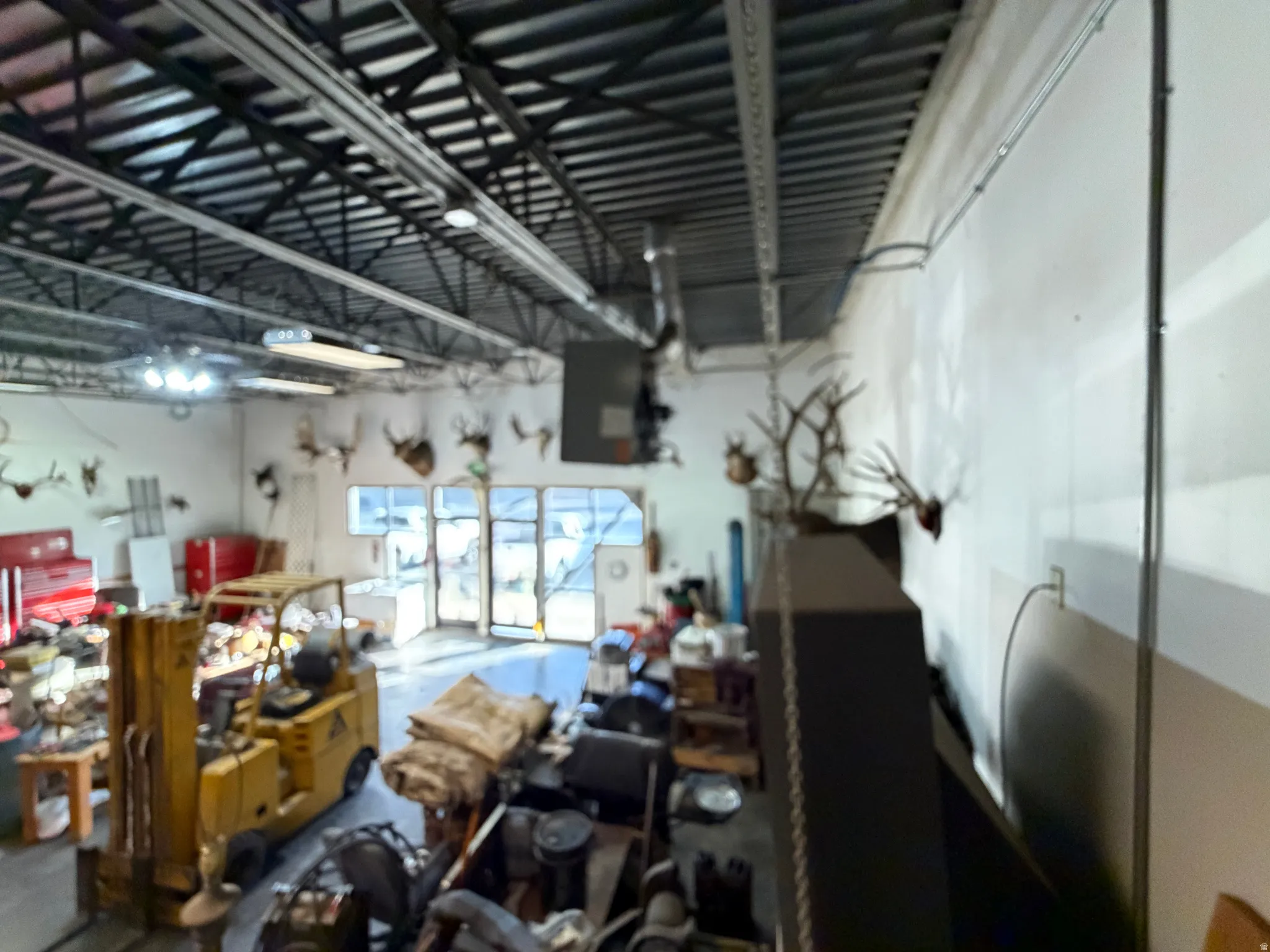 Miscellaneous room with concrete floors