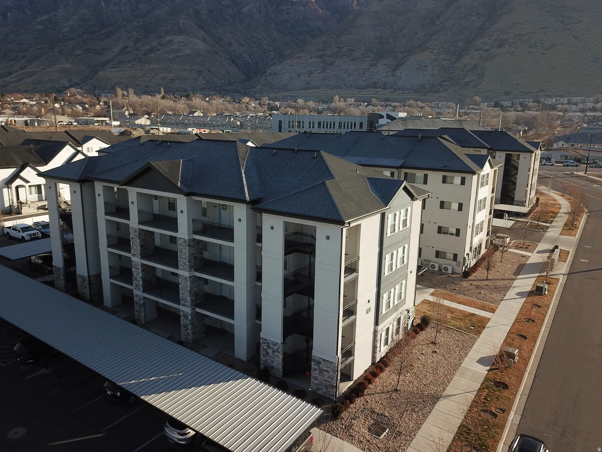 Exterior space with stone siding and a mountain view
