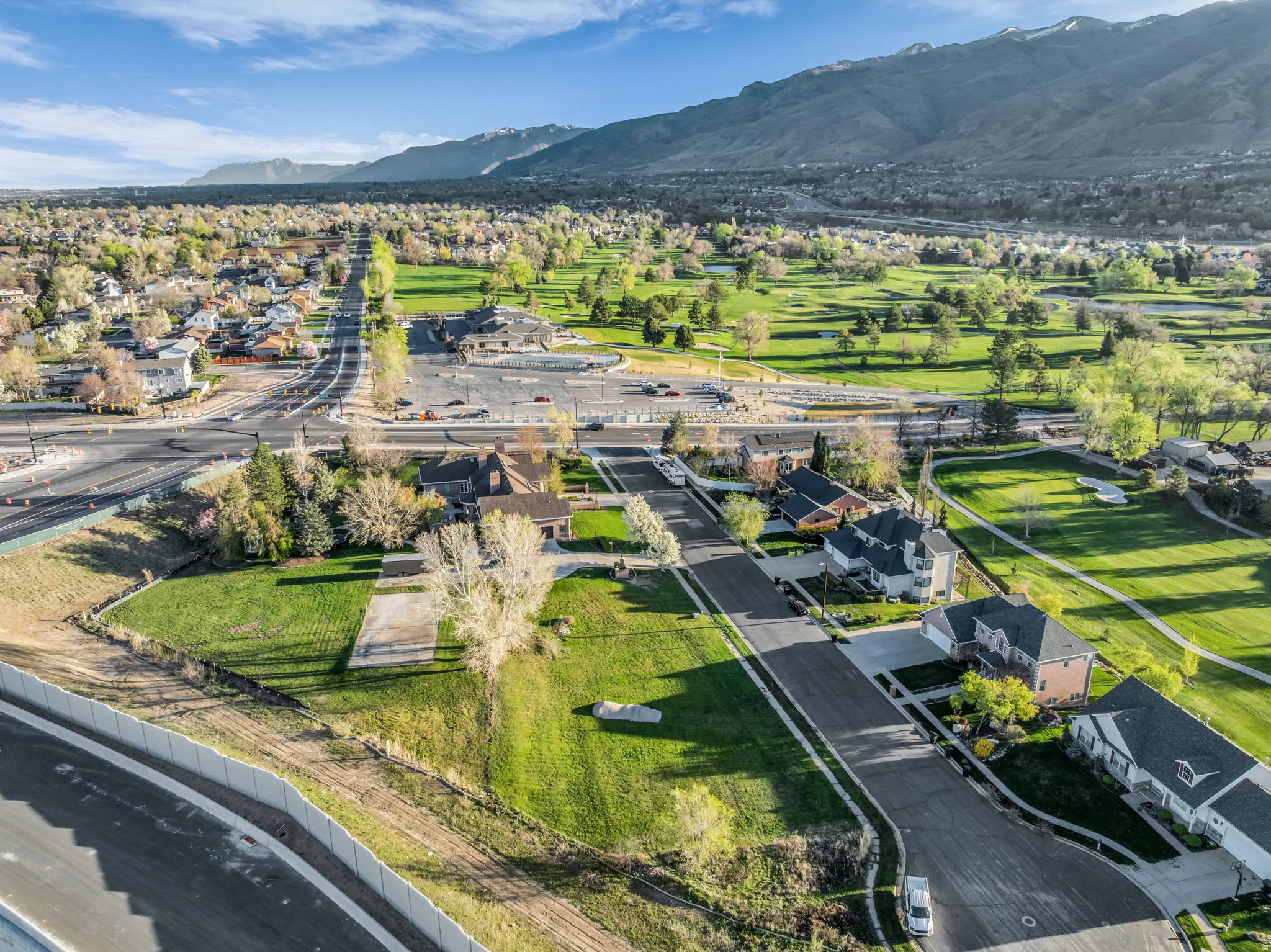 Aerial perspective of suburban area with a mountain backdrop