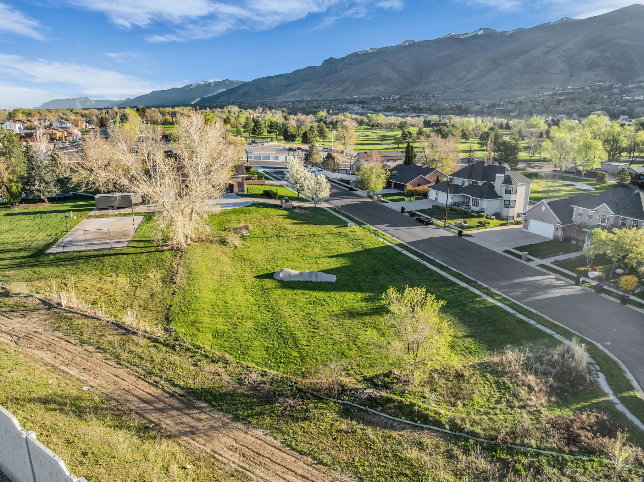 Aerial view of residential area featuring mountains